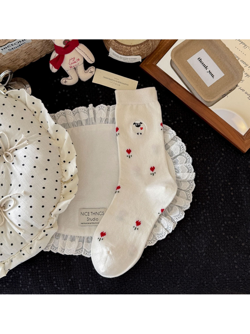 Floral crew sock with embroidered sheep motif, full view