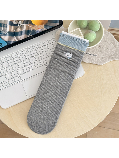 Cat gray socks with embroidered motif and ruffled blue cuff