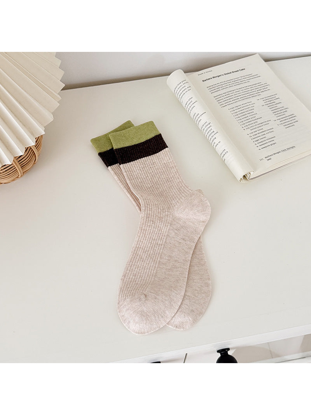 Beige ribbed crew socks with dark brown and light green cuff bands