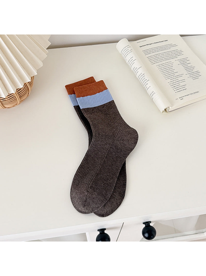 Dark Brown ribbed crew socks with light blue and orange cuff bands
