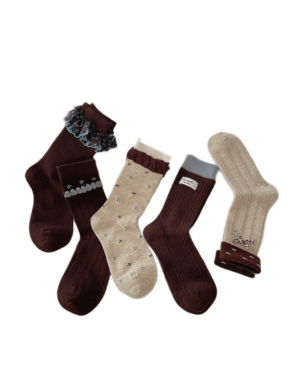 Five crew sock styles displayed together on a white background