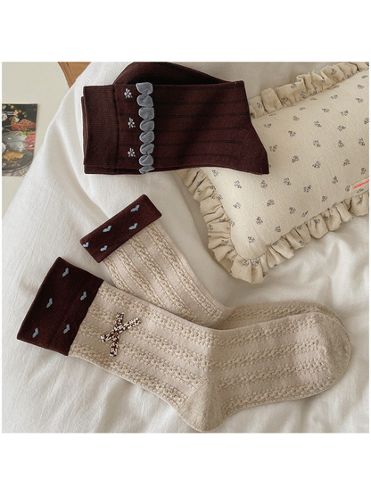 Dark brown Bubble Cuff and beige Heart Bow crew socks displayed together