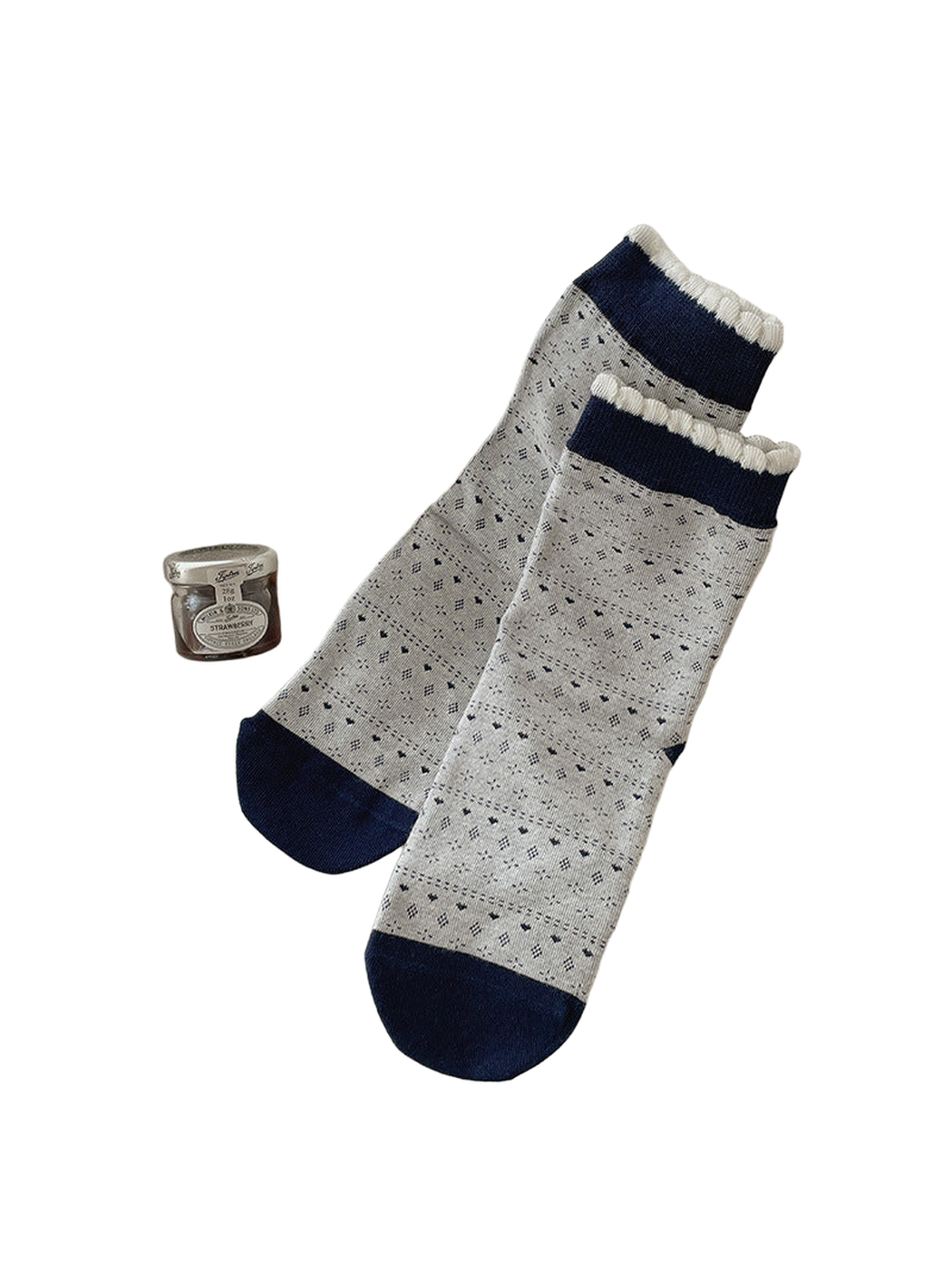 Light Gray crew socks with geometric bands and navy cuffs and toes