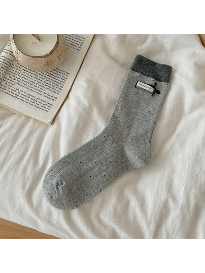Light Gray polka-dot crew sock with dark gray cuff and bow accent