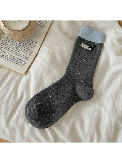Dark Gray polka-dot crew sock with light blue cuff and bow accent