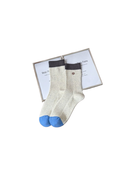 Light Gray ribbed crew socks with dark gray cuffs and blue toes
