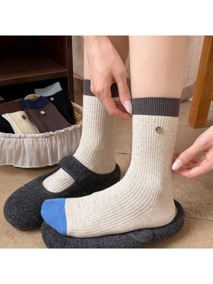 Light Gray ribbed crew socks with dark gray cuffs and blue toes