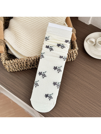 Floral Sprig style ivory crew sock with scattered floral motifs