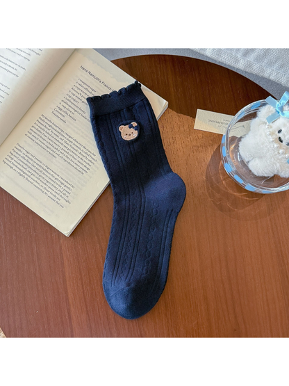 Bear Patch crew sock in navy with a bear-face patch and ruffled cuff