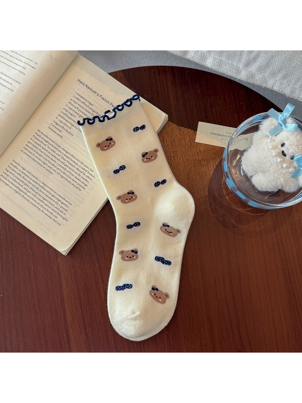 Bear Bows crew sock in ivory with an all-over bear and navy bow pattern