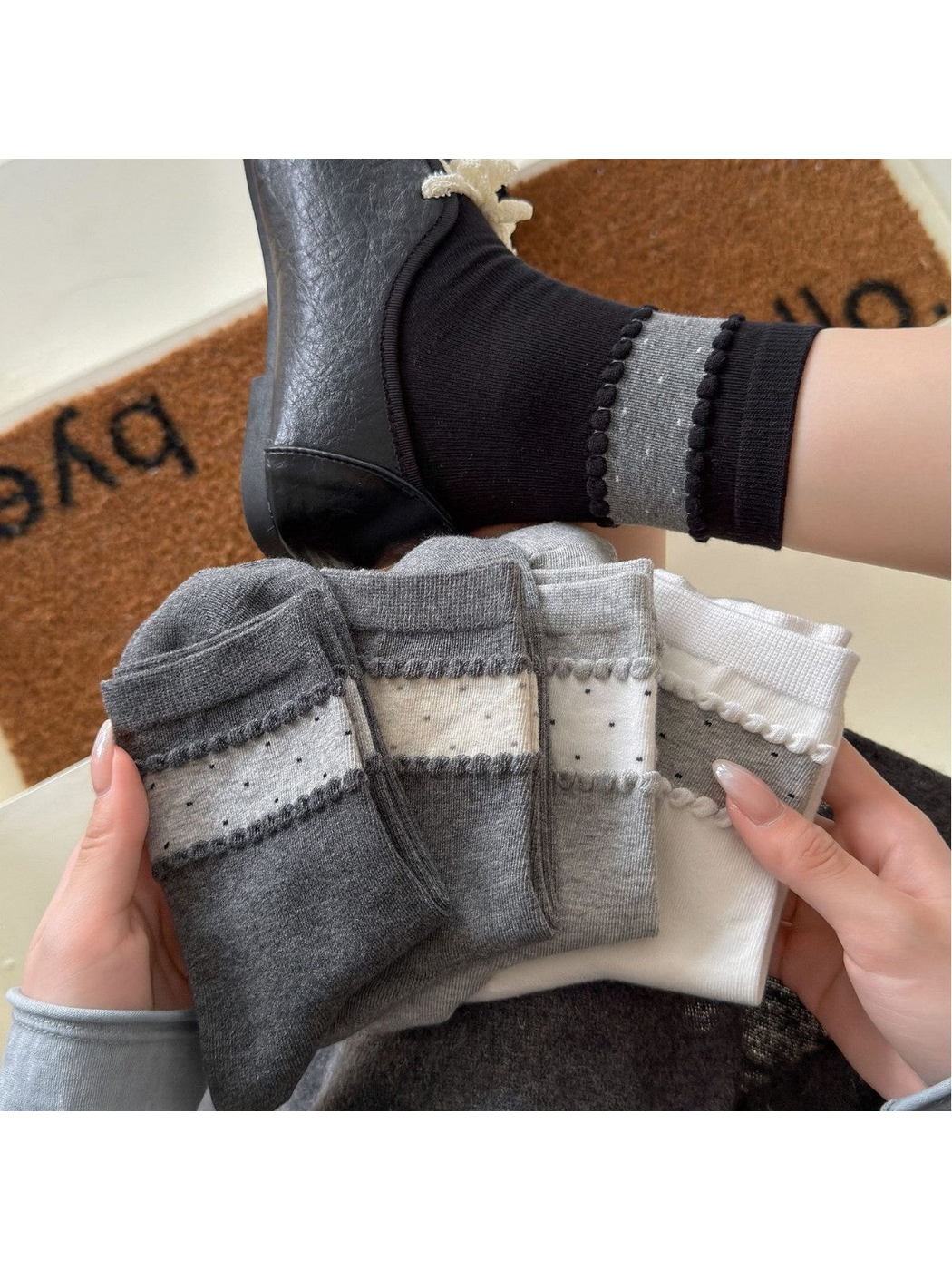 Black, White, Light Gray, Dark Gray and Gray crew socks displayed together