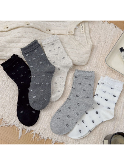 White, Black, Dark Gray, Ivory and Light Gray floral crew socks displayed together