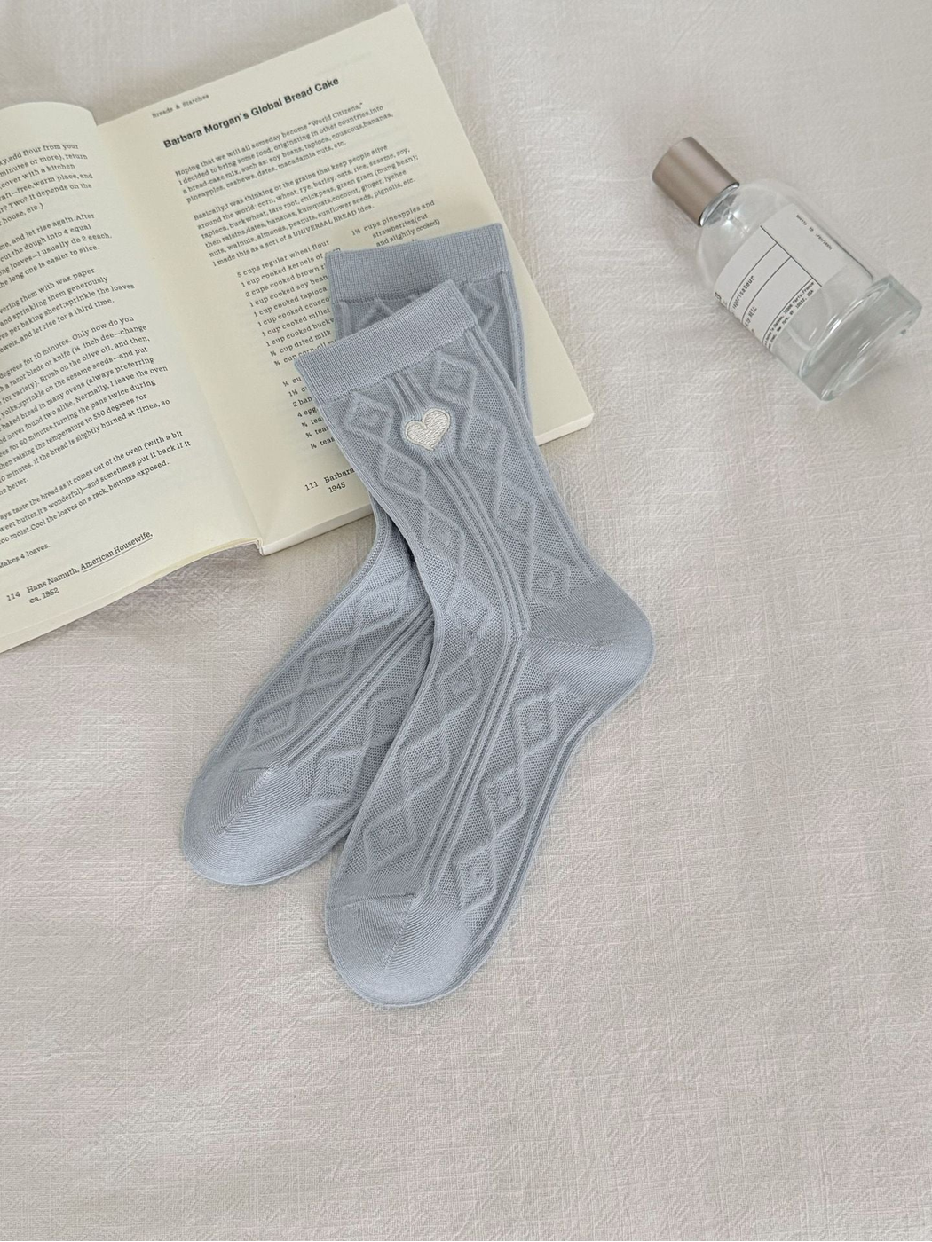 Heart Diamond crew socks in light blue with a diamond pattern and embroidered heart
