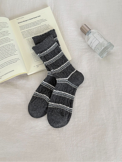 Stripes crew socks in dark gray with narrow horizontal stripes, pair displayed flat