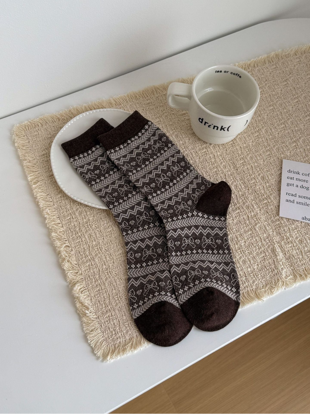 Geometric crew socks with brown and ivory patterned bands