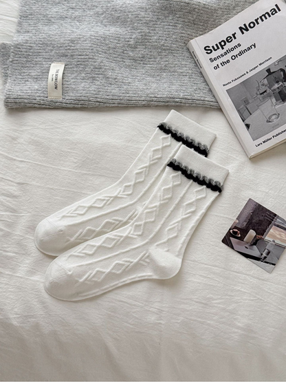 Diamond style ivory crew socks with raised diamond pattern