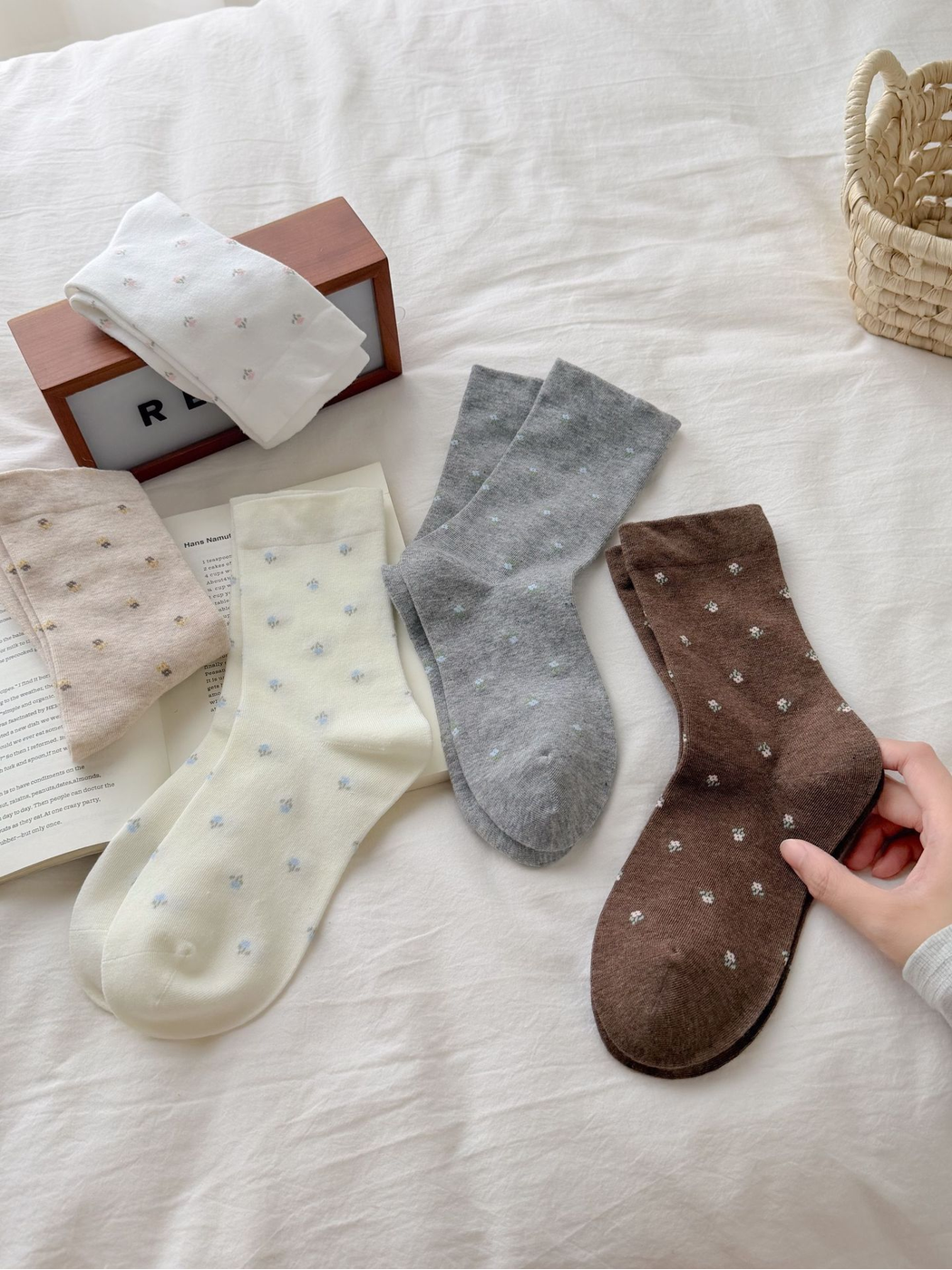 Ivory, Beige, White, Coffee and Light Gray floral crew socks displayed together