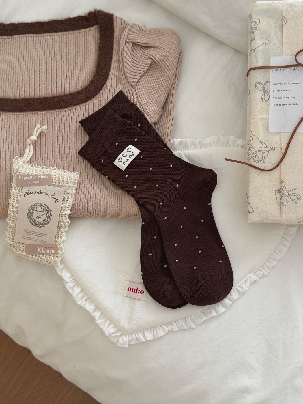 Heart Label brown polka-dot crew socks displayed as a pair