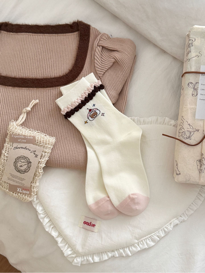 Ruffle Bear ivory crew socks with pink toes and two-tone ruffled cuffs