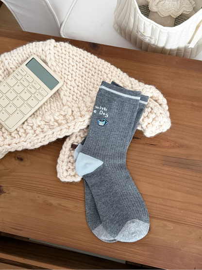 Cup dark gray crew socks with lettering, embroidered cup motif and light blue toe