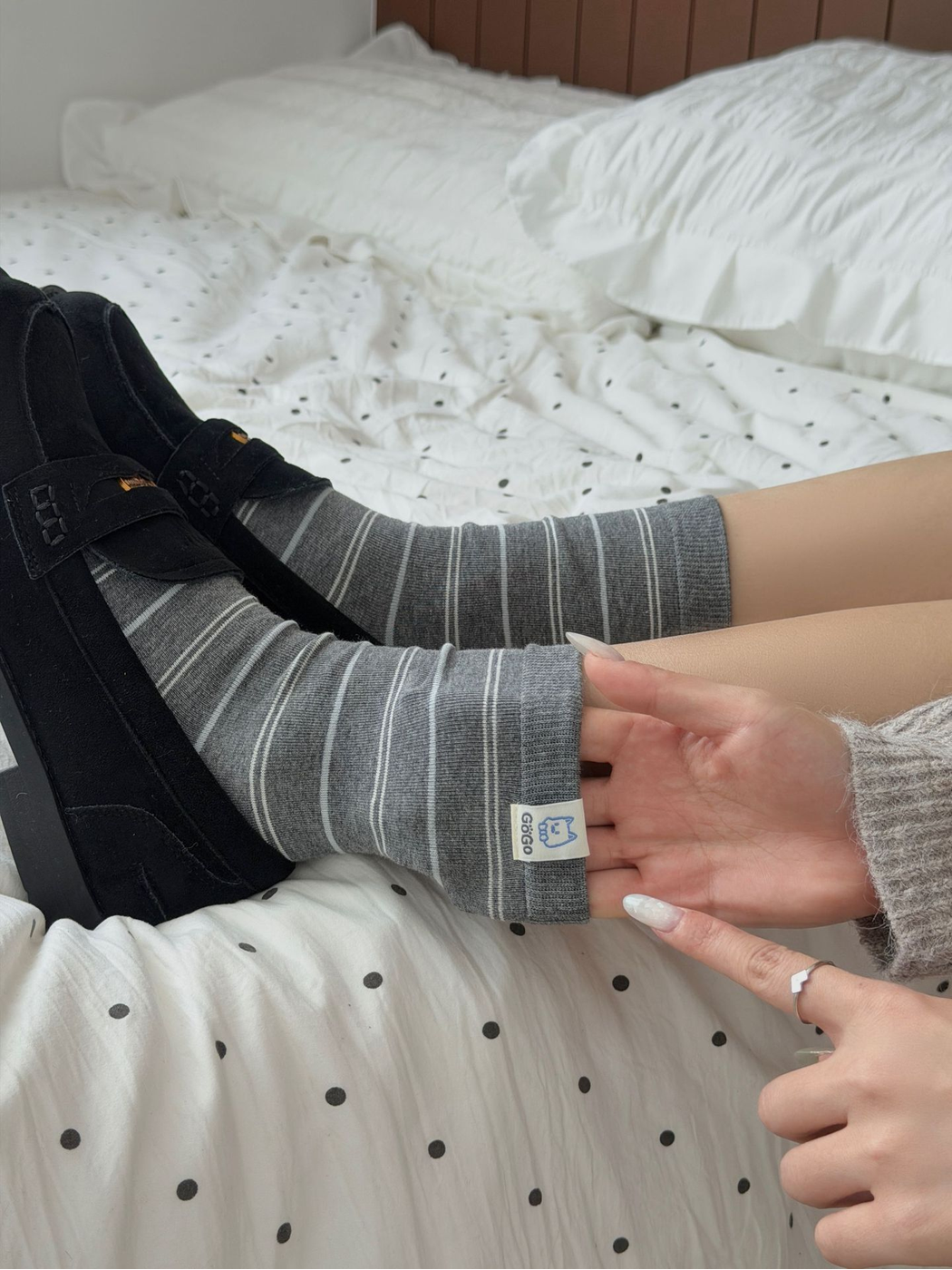 Close-up of the Stripes sock cuff and external woven label