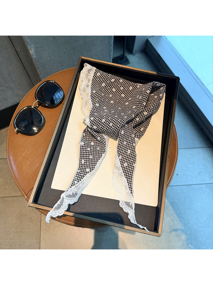 Black gingham triangle scarf with small floral motifs, tapered ties and scalloped lace trim