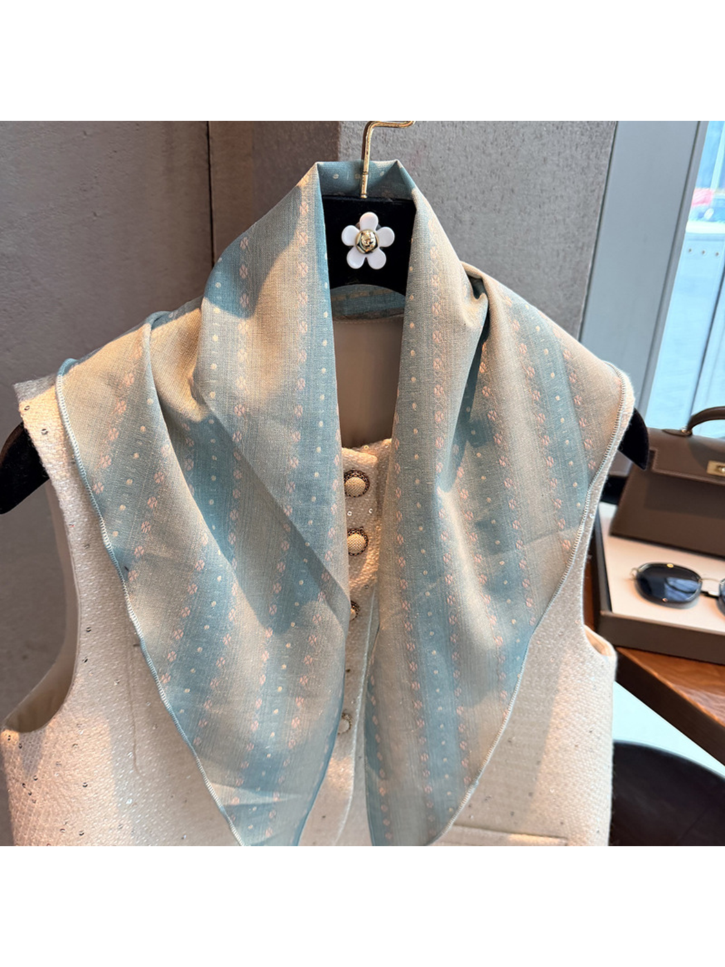 Close-up of the Light Blue scarf's striped pattern and semi-sheer woven-look surface
