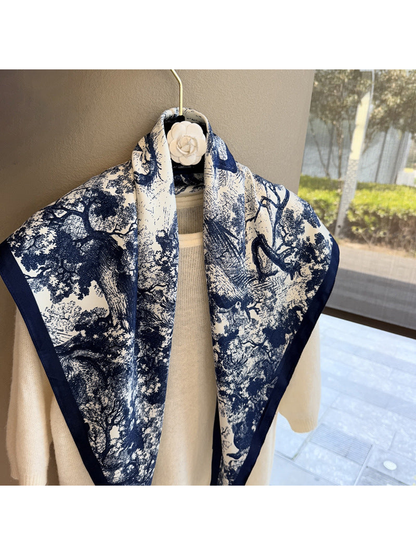 Close-up of the navy and ivory woodland pattern and navy border