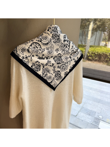 White paisley triangle scarf displayed from the back
