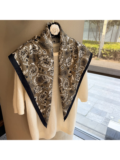 Khaki paisley triangle scarf with dark border, full draped view