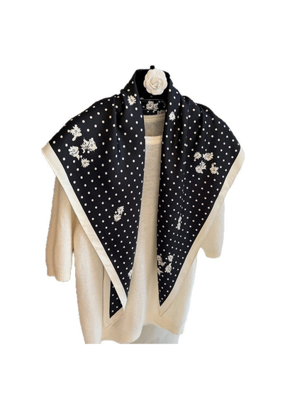 Black triangle scarf with ivory polka dots, small floral clusters and contrasting border