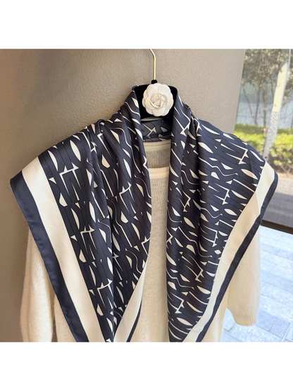 Close-up of the black and ivory abstract geometric pattern