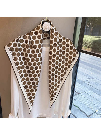 Brown polka-dot scarf with contrasting border, full draped view