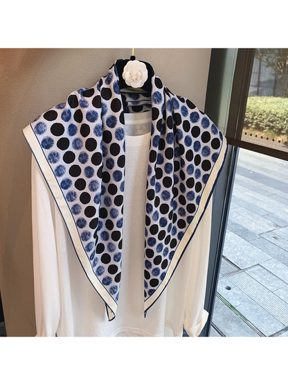 Blue polka-dot scarf with contrasting border, full draped view