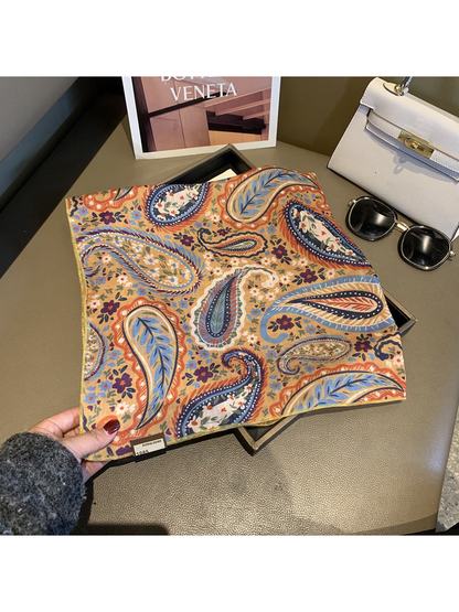 Beige square scarf opened to show the paisley and floral pattern