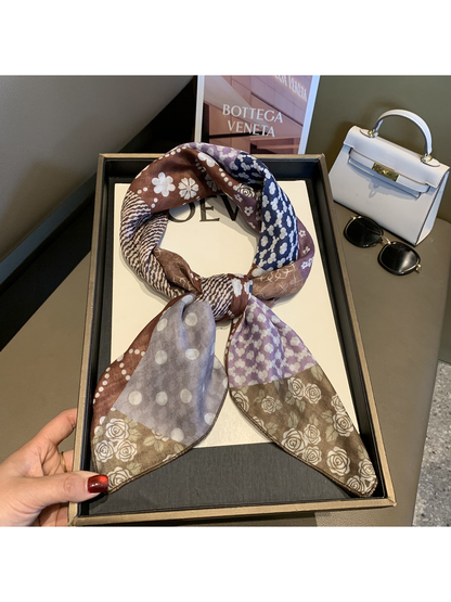 Coffee floral patchwork scarf tied in a loose knot, full view