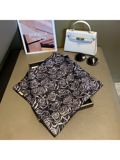 Black square scarf with an all-over pale pink rose pattern