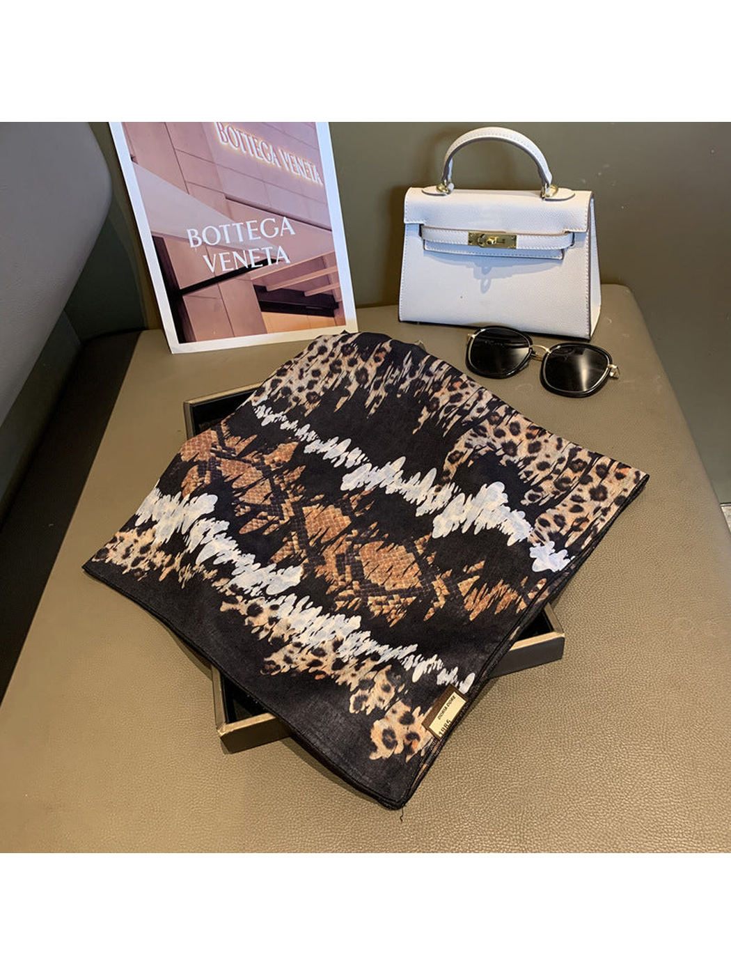 Square scarf with black, tan and cream mixed animal and abstract print