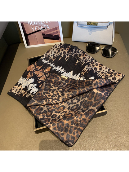 Reversible scarf detail showing mixed animal print and leopard-print reverse