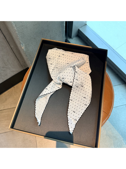 White polka-dot triangle scarf with small bow motifs and scalloped edging