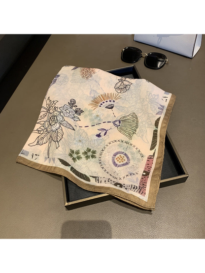Ivory square scarf folded to show the floral and abstract botanical print
