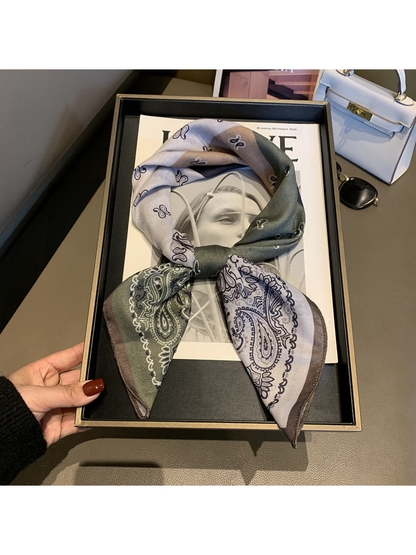 Multicolor paisley scarf tied in a loop-and-knot display