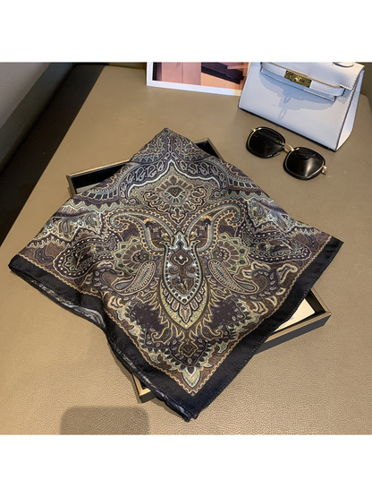 Square paisley scarf displayed open with a narrow dark border