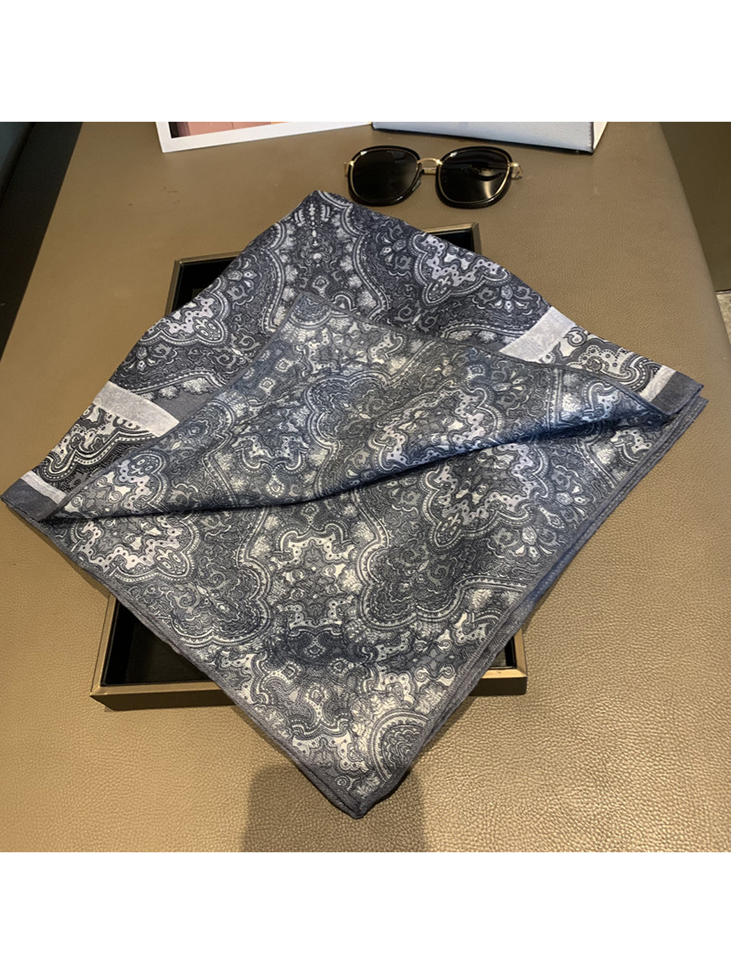 Reverse-side detail of the gray-blue paisley scarf and narrow stitched edge