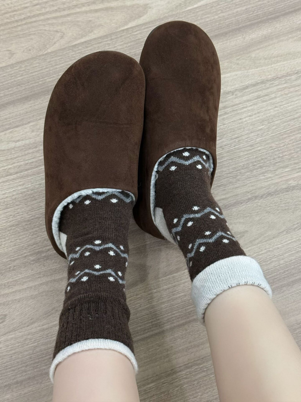 Coffee crew socks worn with brown slippers
