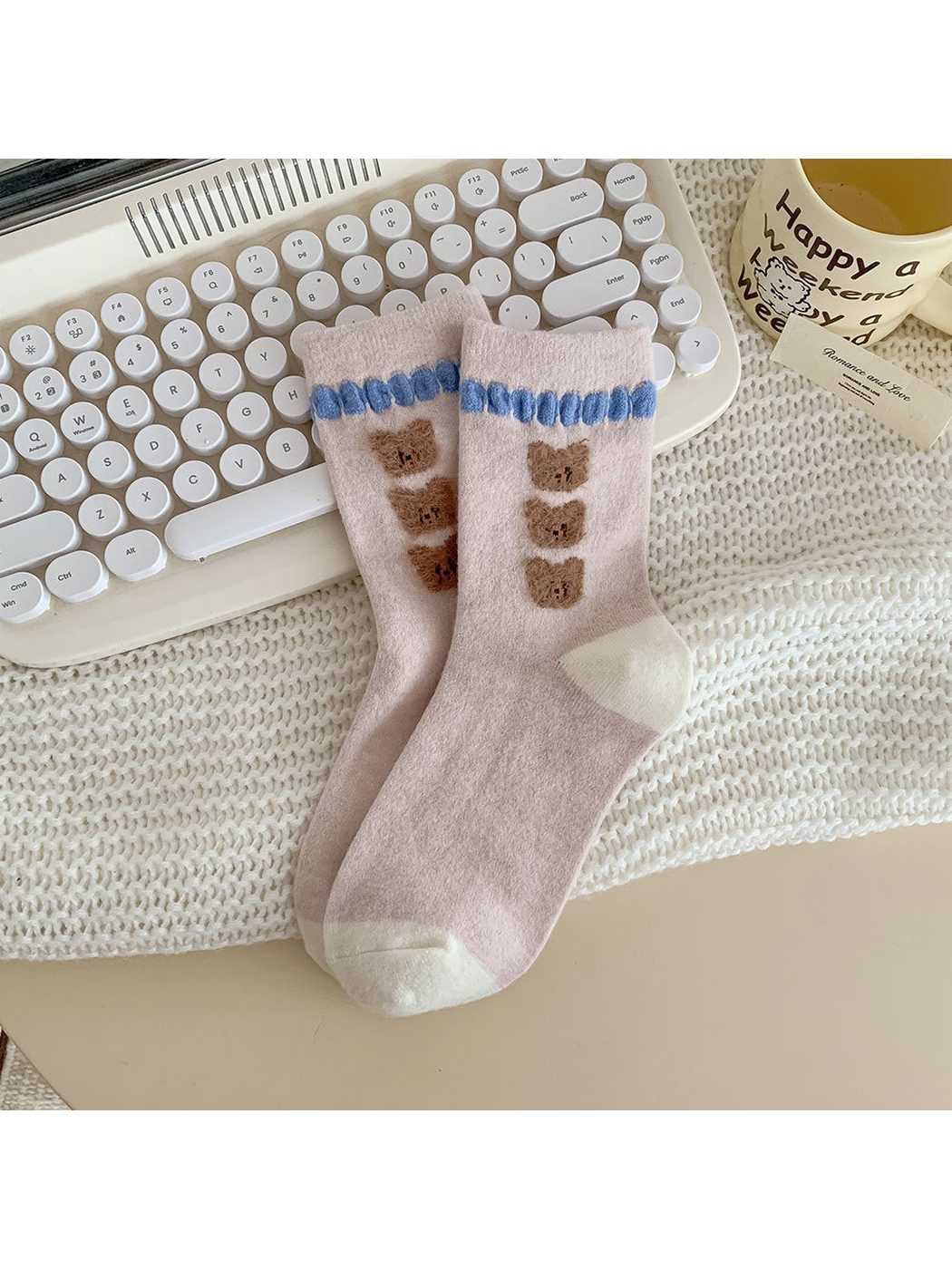 Three Bears light pink crew socks with stacked bear faces and blue trim