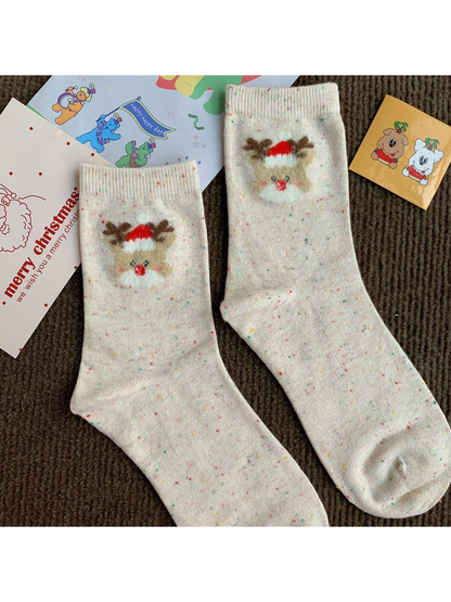 Reindeer cream crew socks with a fuzzy holiday motif