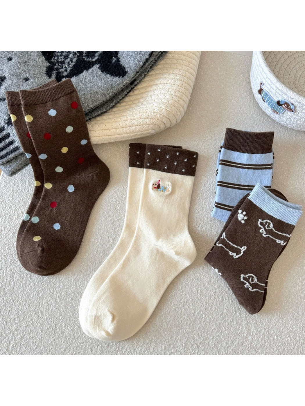 Assorted crew socks in Dachshund, polka dot, dog outline and striped styles