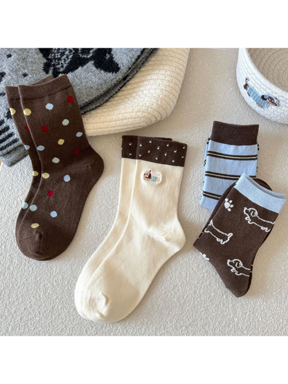 Assorted crew socks in Dachshund, polka dot, dog outline and striped styles