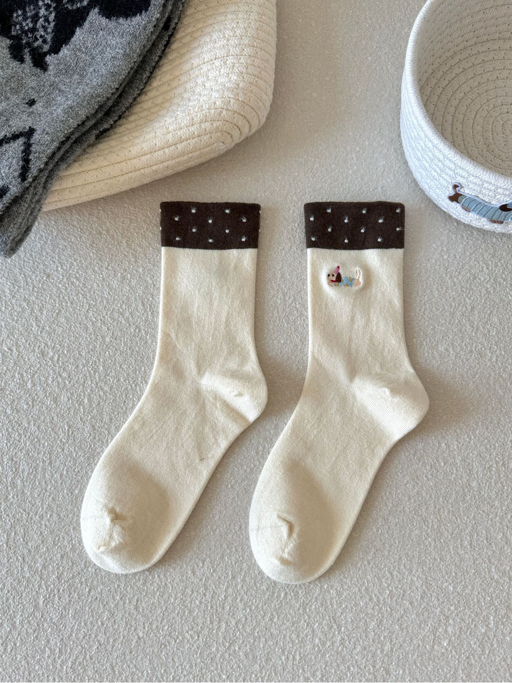 Ivory Dachshund crew socks with contrasting brown dotted cuffs